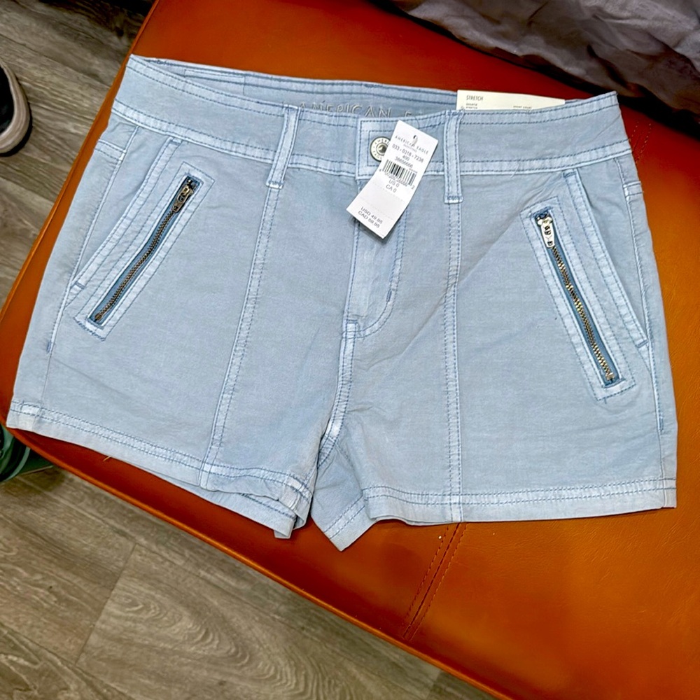 NWT American Eagle snappy stretch low-rise shorts- faded blue, size 0